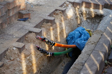 Colorful fiber optic cables laid in the ground, buried cables for faster internet, city of Garbsen...
