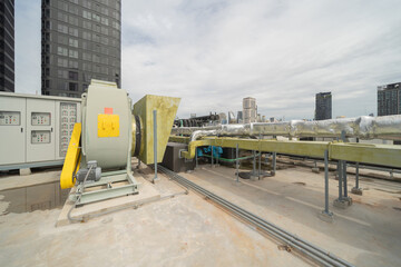 Chiller tower or cooling tower on rooftop of a office building in urban city. System work....