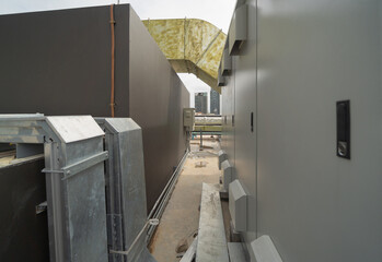 Chiller tower or cooling tower on rooftop of a office building in urban city. System work....