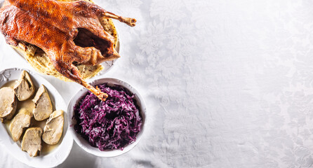 Roasted goose with red cabbage and stewed liver - Top of view © weyo