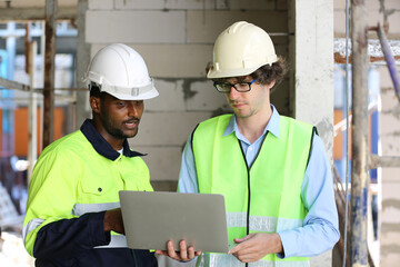 Residential Building. Construction Industry. Caucasian Contractor in the Building.