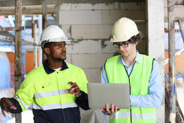 Residential Building. Construction Industry. Caucasian Contractor in the Building.