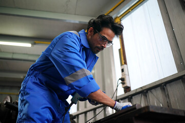 Workers changing and repair part of wheels at the car service