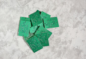 Electronic printed circuit boards on a light background.