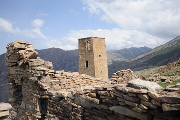 View of ancient stone watchtower in mountain village Goor, Dagestan, North Caucasus