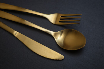 Golden spoon, knife and fork - 523602220