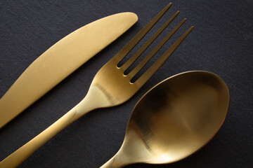 Golden spoon, knife and fork - 523602221