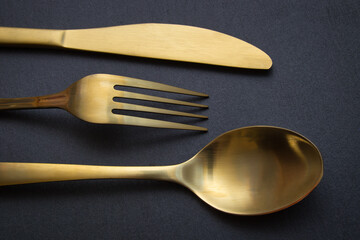 Golden spoon, knife and fork - 523602224