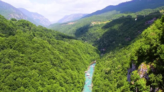 Tara River Canyon or Tara River Gorge located between high mountains. Canyon is the largest and deepest canyon in Europe. View from Durdevica Tara Bridge  in northern Montenegro.