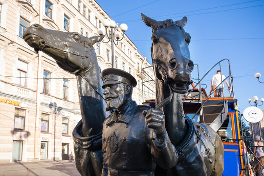 Konka monument in St. Petersburg, sculpture of coachman and horses close-up, sunny day - Saint Petersburg, Russia, August 2022