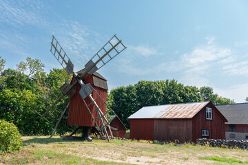 Plakat old windmill in the countryside