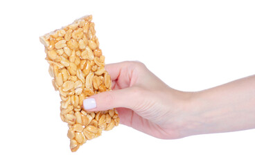 Fototapeta premium Kozinaki with peanuts in hand on white background isolation