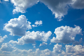 Texture of white clouds on a blue sky.. Cloudy sky.