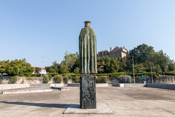 Guimaraes, Portugal. Statue of Mumadona Dias, Countess of Portugal, looking at the Paco dos Duques...