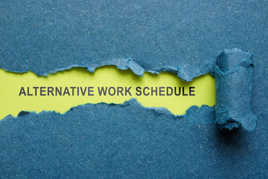 A torn piece of paper and an inscription Alternative work schedule AWS.