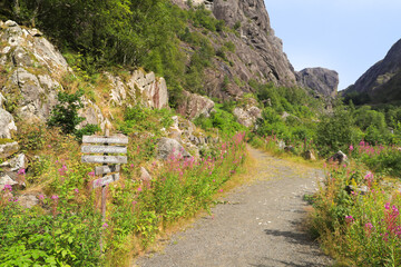 Guide post on hiking trail around the Helleren houses in Magma UNESCO Global Geopark, Sogndal...