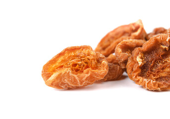 Dehydrated apricots, close up.  Pile of  orange apricot fruit halves made in a home dehydrator to preserve and extend shelf life. Selective focus.