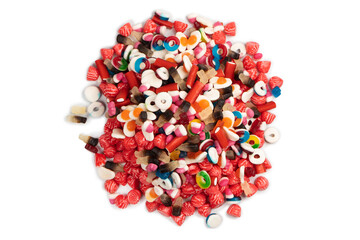 Tasty mix of jelly colorful candies isolated on a white background.
