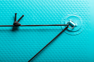 An elastic band for luggage and things on a sapbood is large.