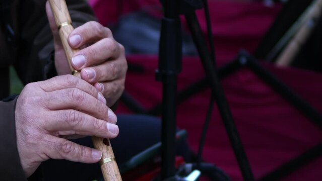 Man Playing Turkish Traditional Music Instrument Flute. Named Ney Playing Sufi Music