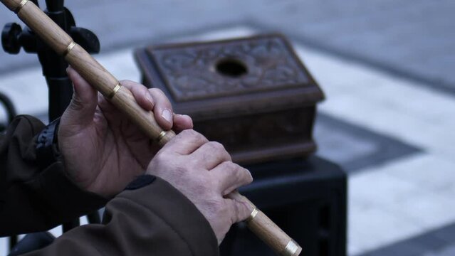 Man Playing Turkish Traditional Music Instrument Flute. Named Ney Playing Sufi Music