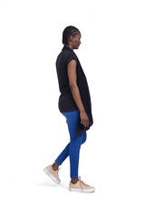 Naklejka premium side view of a full portrait of a woman walking on white background
