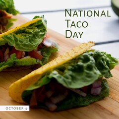 Fototapeta premium Composition of october 4 national taco day text with tacos on cutboard
