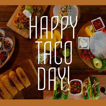 Composition of happy taco day text with tacos on table