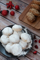 Almond snow balls or Christmas cookies  kourabiedes with almonds powered with white sugar