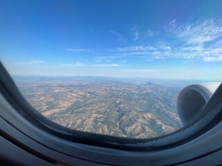 view from the plane window over Italy
