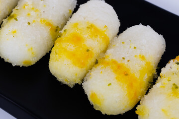 Close up of Indian sweet food Long Rasgulla Also Know as Rosogolla, Roshogolla, Rasagola, Ras Gulla, Anguri Rasgulla or Angoori Rasgulla a Dessert Popular in India, Isolated on White Background
