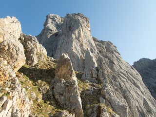 mountain rock cilmbing in wilder kaiser gebirge in austria