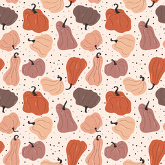 Hand drawn seamless pattern with pumpkins in bright colors with different shapes