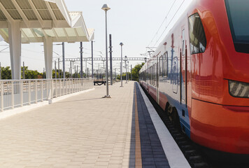 Railway station platform and train.