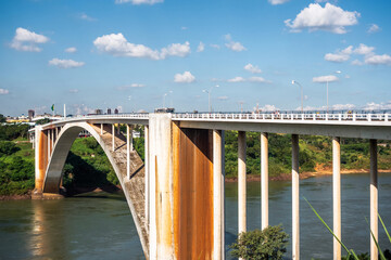 Friendship Bridge (Portuguese: Ponte da Amizade ) over the Parana river, connecting Foz do Iguacu, Brazil, to Ciudad del Este in Paraguay.	
