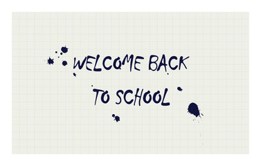 A careless Welcome back to school inscription in ink with blotches on a notebook. Use it as a banner or greeting.