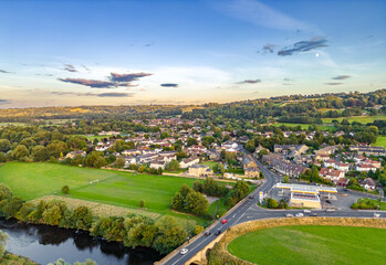Aerial view of the West Yorkshire village of Pool in Wharfedale in the countryside. Shot by drone.
