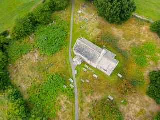 Foto op Canvas Aerial view of 12th Century Norman built church in the North Yorkshire countryside. Shot by drone. © PhotographyBradley