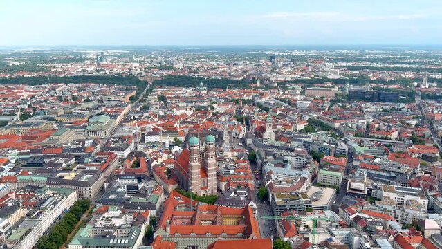 Munich, German M&uuml;nchen, city, capital of Bavaria Land (state), southern Germany. Aerial view of central building landmarks, Frauenkirche gothic church, St. Peter's, St. Lukas around Altstadt, Old Town