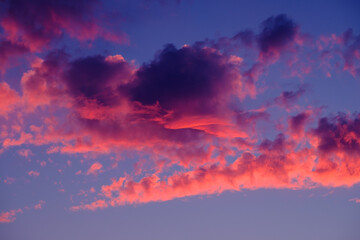 Red and purple clouds in the sunset sky.