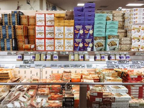LOS ANGELES, CALIFORNIA, USA - May 14 2018: Frozen foods, cracker and biscuits with beautiful packaging design inside Trader Joe's, an American supermarket owned by German Aldi Nord discount chain