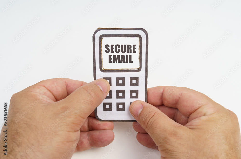 Poster in the hands of a person is a cardboard model of a telephone with an inscription on the screen - sec