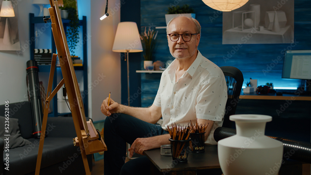 Poster portrait of retired man drawing professional artwork on canvas, using creative skills to sketch auth