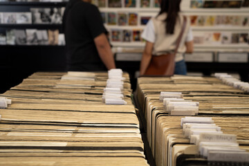 Selective focus at label, tag name of old folders of postcard archives in postcard store. 