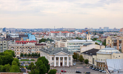 beautiful view of summer Kiev. Roofs of Podol and a view of the left bank