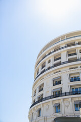 Fototapeta na wymiar White Circular Building against Blue Sky