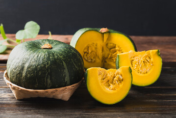 Green pumpkin on wooden background, Organic vegetable in autumn season