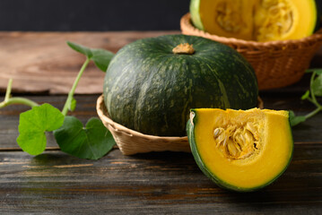 Green pumpkin on wooden background, Organic vegetable in autumn season