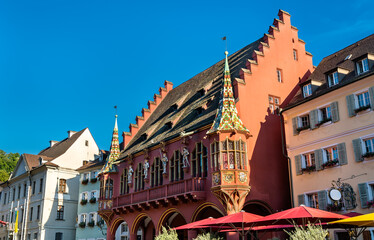 Obraz premium The Historical Merchants Hall on the Minster Square in Freiburg im Breisgau - Baden-Wurttemberg, Germany