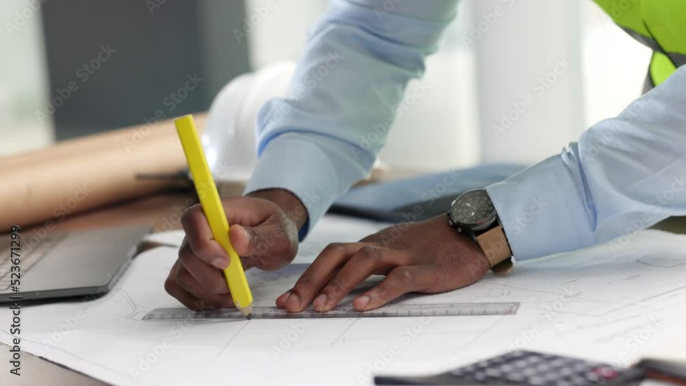 Poster Architect, engineer and designer drawing, drafting and measuring blueprint plans for a building project. Closeup on hands of planner developing layout, sketch and plan for a construction development